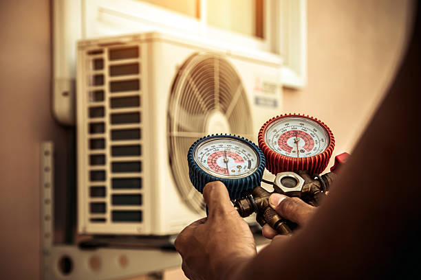 Professional Air Conditioning Service technician working in Kealia, HI